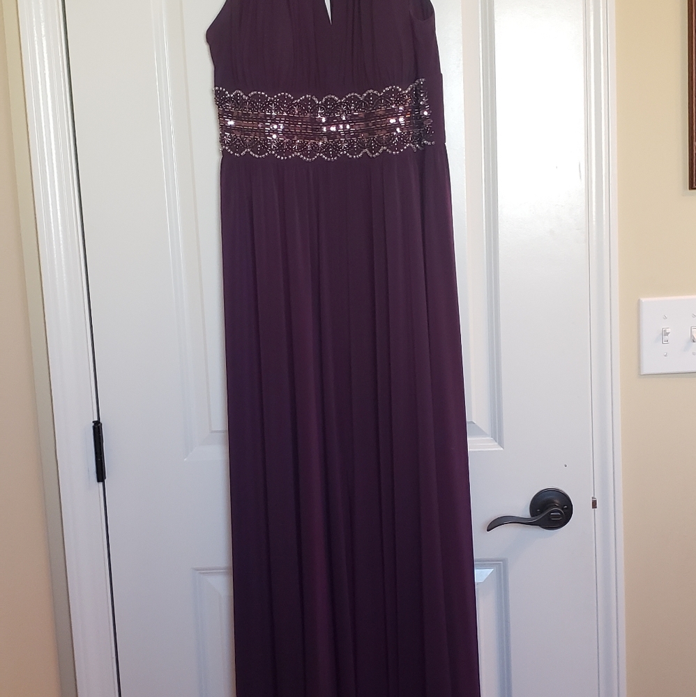 High Neck Key Hole gown with crystal waist.  Size 12-14